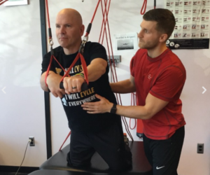 The Recovery Project employee working with a patient
